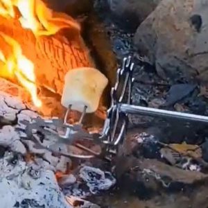 Gyroaster 2 axis Rotating Marshmallow Toasting & Roasting Tool Roasting a Marshmallow in a fire