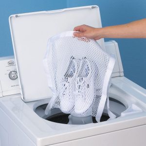 Sneaker Wash and Dry Bag With Shoes Being Put In Washer