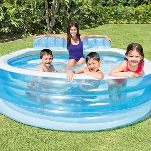 Family Playing in Intex Swim Center™ Inflatable Family Lounge Pool In Backyard