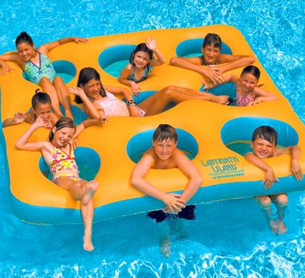 Kids Laying In Nine Person Pool Float