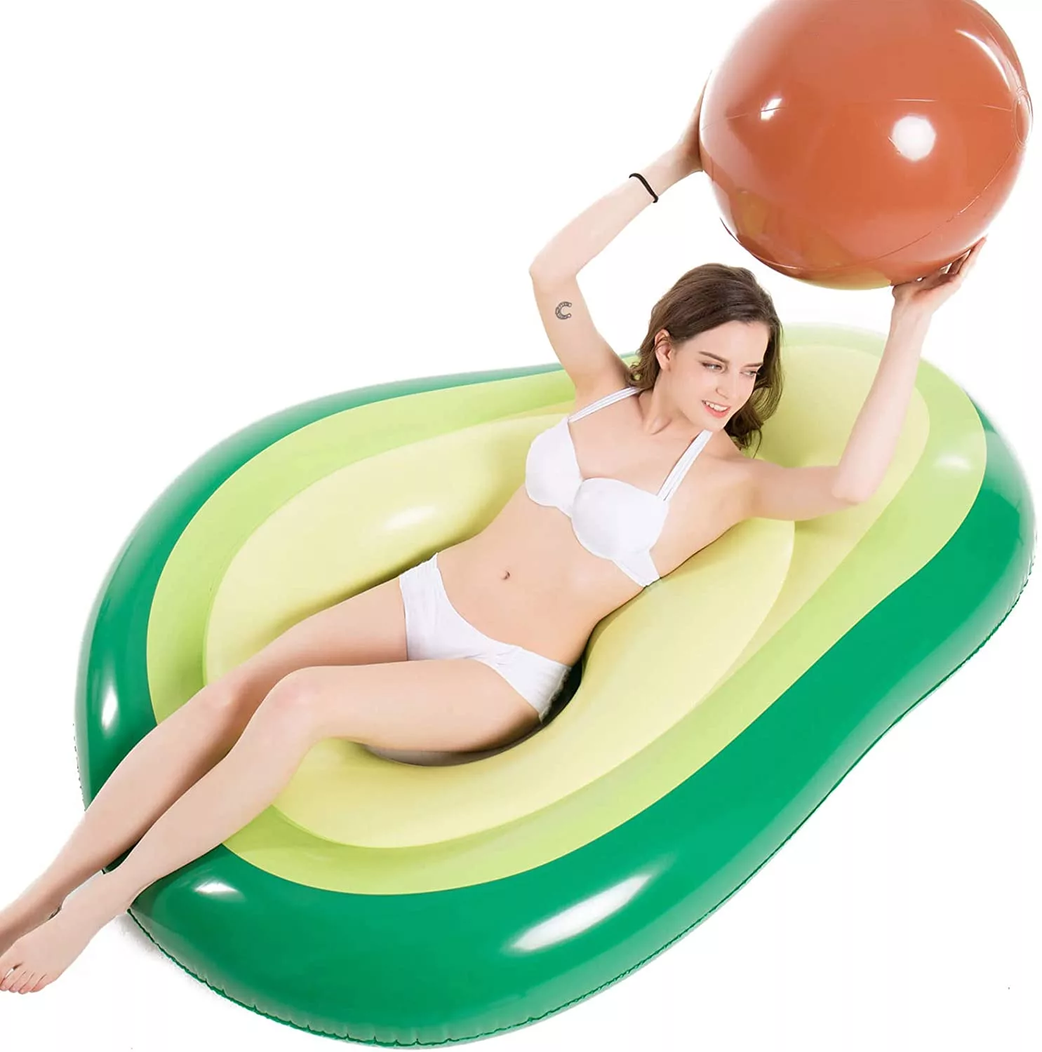 Woman Laying In Avocado Pool Float With Removable Pit Holding Removable Pit Ball