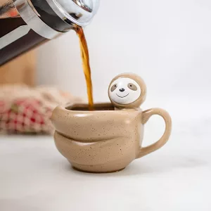 Coffee Pouring Into Sloth Shaped Coffee Mug