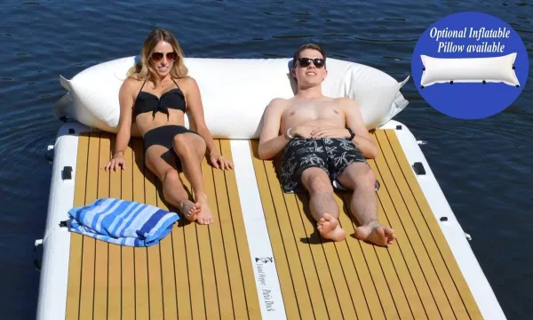Couple Laying On Inflatable Patio Deck Sunbathing