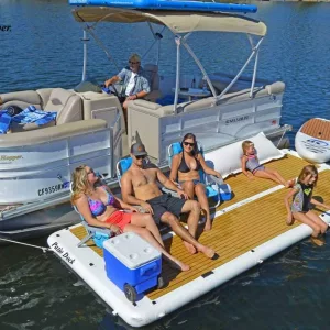Family Lounging on Inflatable Patio Deck Attached To Boat