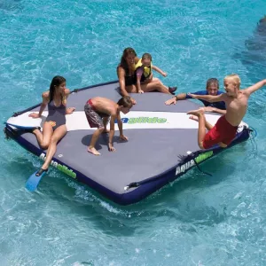 Family Playing on Giant Floating Mattress With Cooler