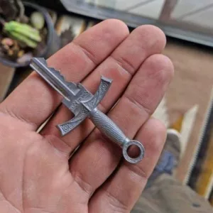 Hand Holding Forged Sword Key Shape