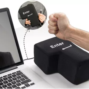 Hand pressing USB Connected Stress Relief Plush Pillow That Becomes Your EnterReturn Button