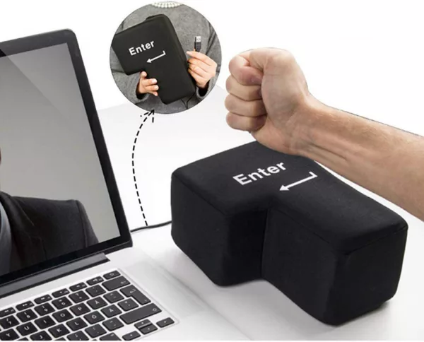 Hand pressing USB Connected Stress Relief Plush Pillow That Becomes Your EnterReturn Button