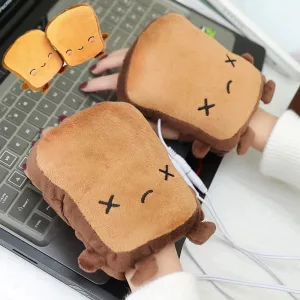 Hands With Toast Shaped USB Heated Hand Warmers On Typing on Laptop