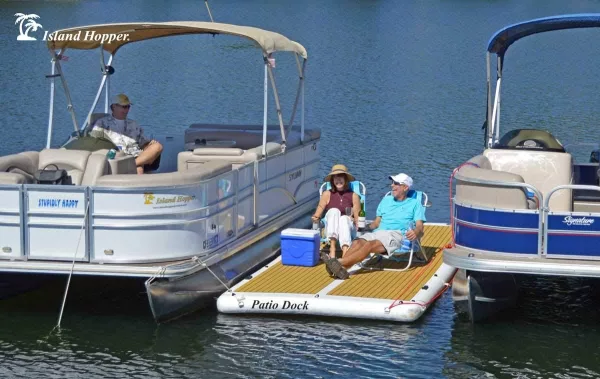 Inflatable Patio Deck Floating Between Two Boats