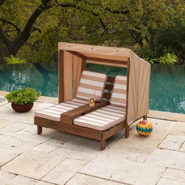Kid Size Double Chaise Lounge On a patio near a pool
