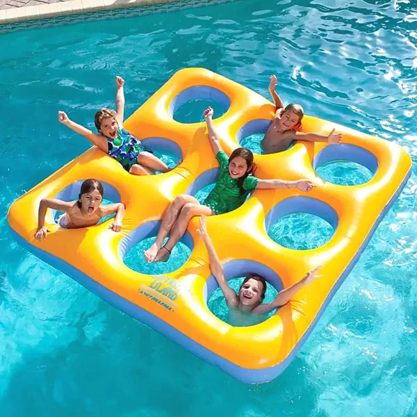 Kids Laying in Nine Person Pool Float With Their Hands Up