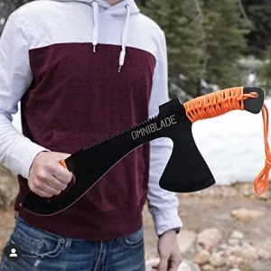 Man Holding 3-in-1 Survival Machete In Front of Him