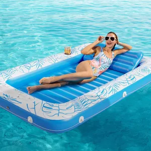 Woman On Lake Floating On Inflatable Tanning Pool Lounger