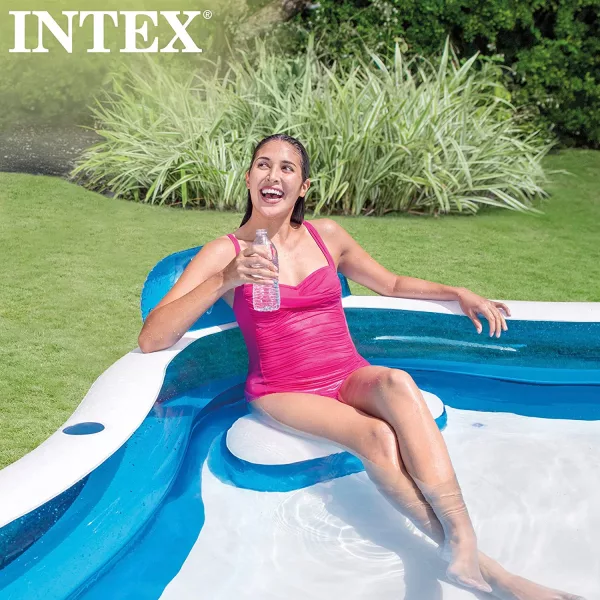 Woman Siting in Inflatable Lounge Chair Pool