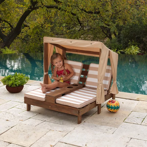 Young Girl sitting on the Kid Size Double Chaise Lounge