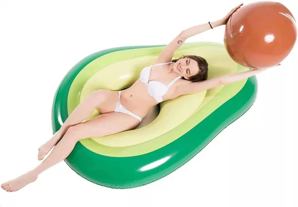Young Woman Laying In Avocado Pool Float With Removable Pit