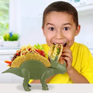 Young boy eating tacos from TriceraTaco Holder