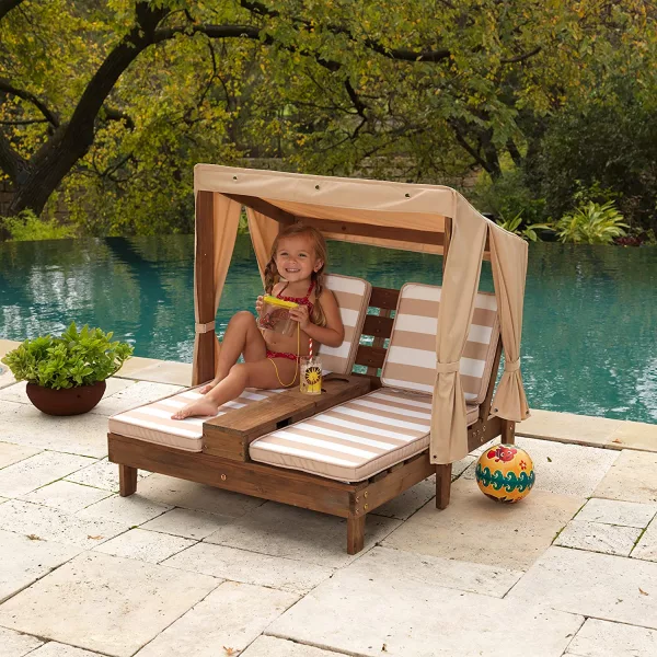 Young girl laying on the Kid Size Double Chaise Lounge