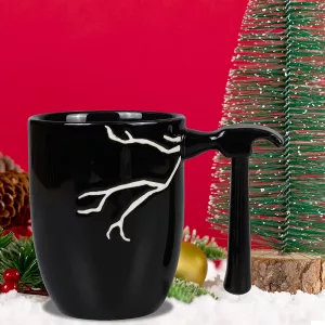 Hammer Handle Coffee Mug Next to Christmas Decorations